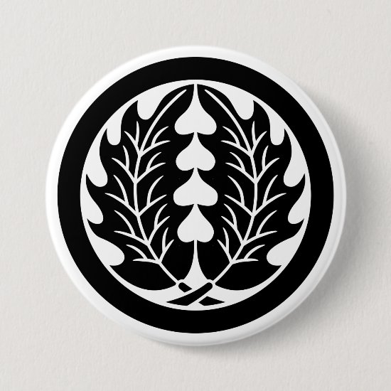 Two symmetrical holly leaves with round as Family crests Button