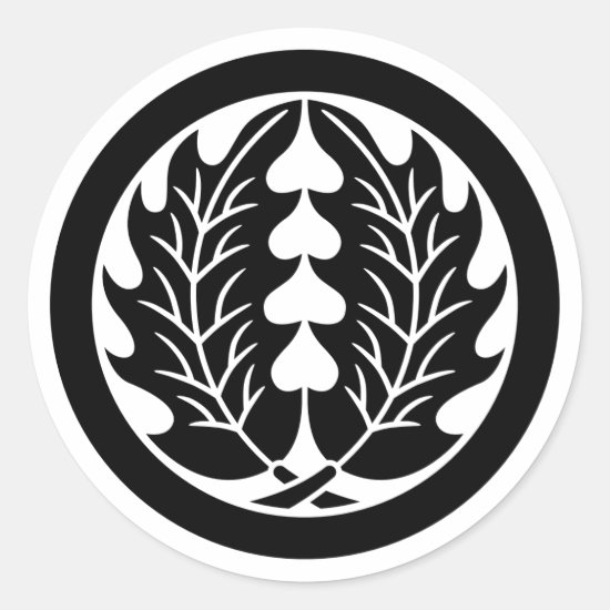 Two symmetrical holly leaves with round as Family crests Sticker