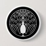 Two symmetrical Japanese gingers with round as Family crests Button