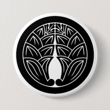 Two symmetrical Japanese gingers with round as Family crests Button
