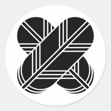 Crossed hawk feathers as Japanese Family crests Sticker
