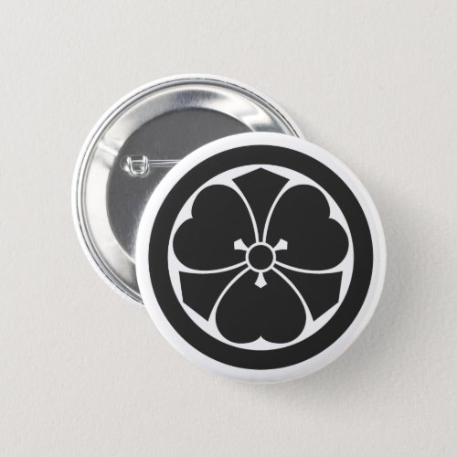 a circle inside Oxalis corniculata with swords for family crests Pinback Button
