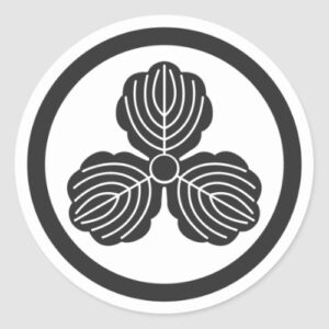 3 oak leaves inside a circle for family crests Sticker