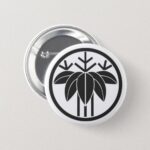 A circle inside Bamboo laves for Family crests Pinback Button