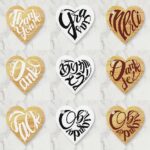 heart shaped thank you in some language s calligraphy tags